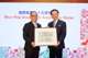 Mr David Mong presented a gift to Mr Kazuhiro Tsuga, President of Panasonic Corporation.