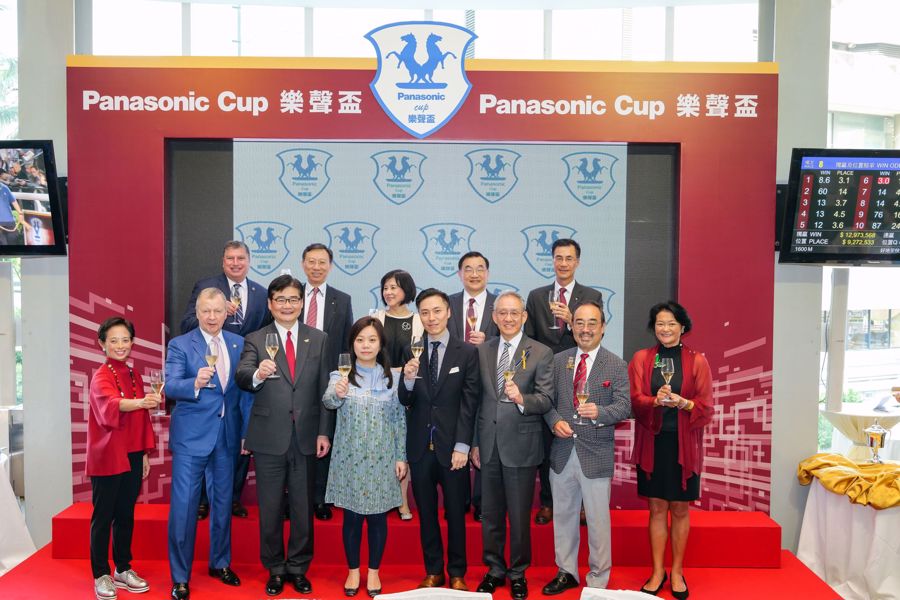 Guests and winning connections of Encouraging, joined together in celebrating the success of Panasonic Cup. (1st row from the left) Ms. Cynthia Mong, Executive Director of Shun Hing Electronic Trading Co., Ltd, Mr. Winfried Engelbrecht-Bresges, CEO of HKJC, Mr. Tetsuro Homma, CEO, China &amp; Northeast Asia Company of Panasonic Corporation, winning connections of Encouraging, Dr. Anthony Chow, Chairman, Hong Kong Jockey Club, , Mr. &amp; Mrs. David Mong, Chairman and CEO of Shun Hing Group, (2nd row from the left) Mr. William Nader, Director, Racing Business &amp; Operations of HKJC, Mr. Nelson Lai, Human Resources Director of Shun Hing Group, Ms. Cheung Man Yee, Vice Chairman of Shun Hing Education and Charity Fund, Mr. Terrence Chan, Vice Chairman of Shun Hing Group, and Mr. Simon Tam, Financial Controller of Shun Hing Group.